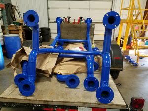 Freshly Powder Coated 3" Pipe Stands being delivered to site